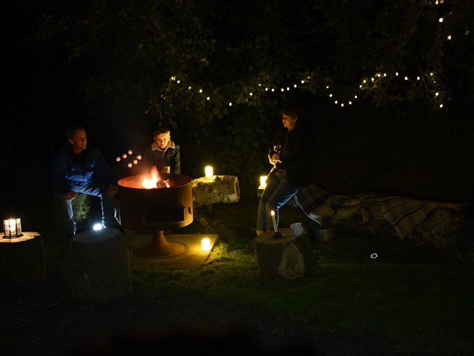 Family time toasting marshmallows.