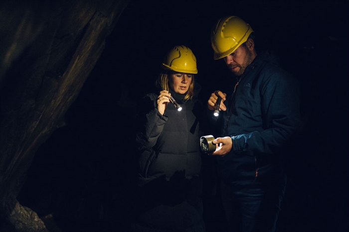Inspecting items abandoned, and forgotten, in the old Welsh slate mine with Corris Mine Explorers