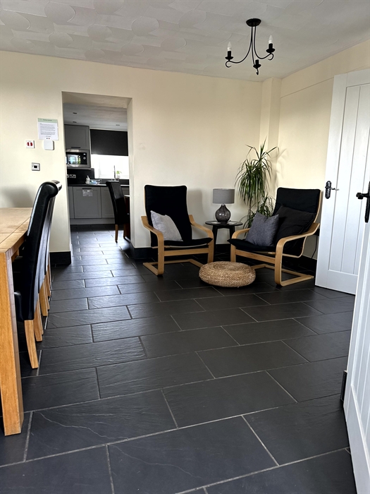 Entrance including dining area. Ground floor bedroom and ensuite bathroom can be accessed via the dining room.