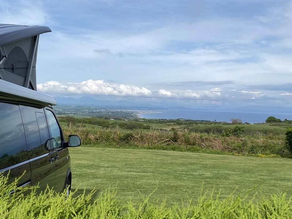 Stunning views from some of our grass pitches - looking onto Snowdonia and Cardigan Bay