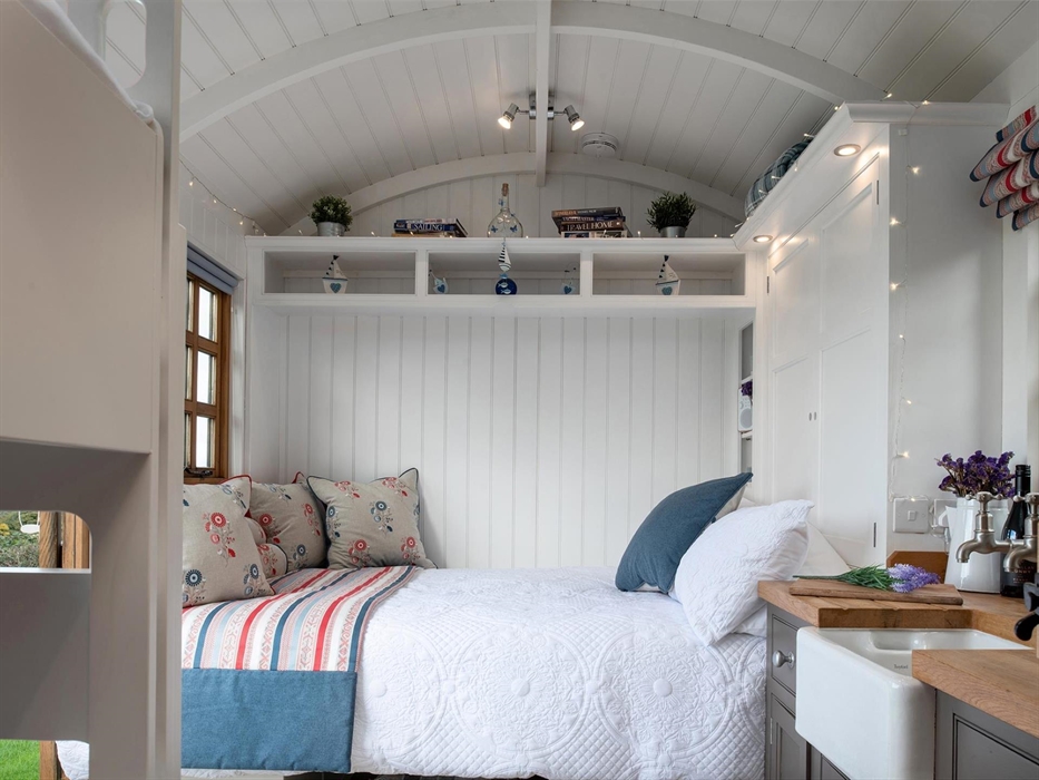 When the bed is folded down some extra shelves are revealed.