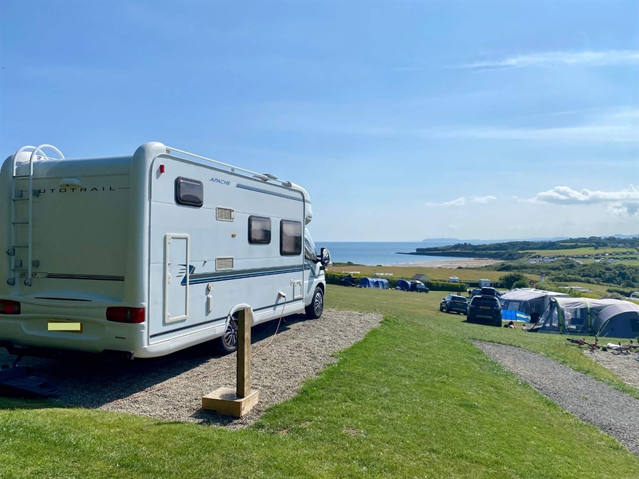 Stunning all-weather serviced pitches suitable for tents, touring caravans and motorhomes