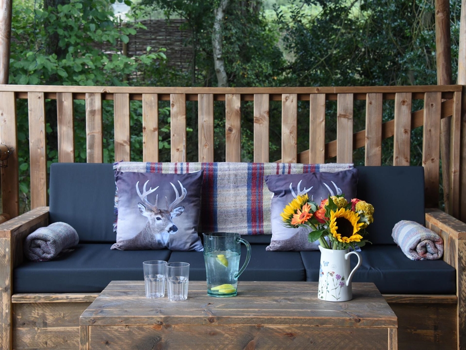 Enjoy sitting under the covered veranda.