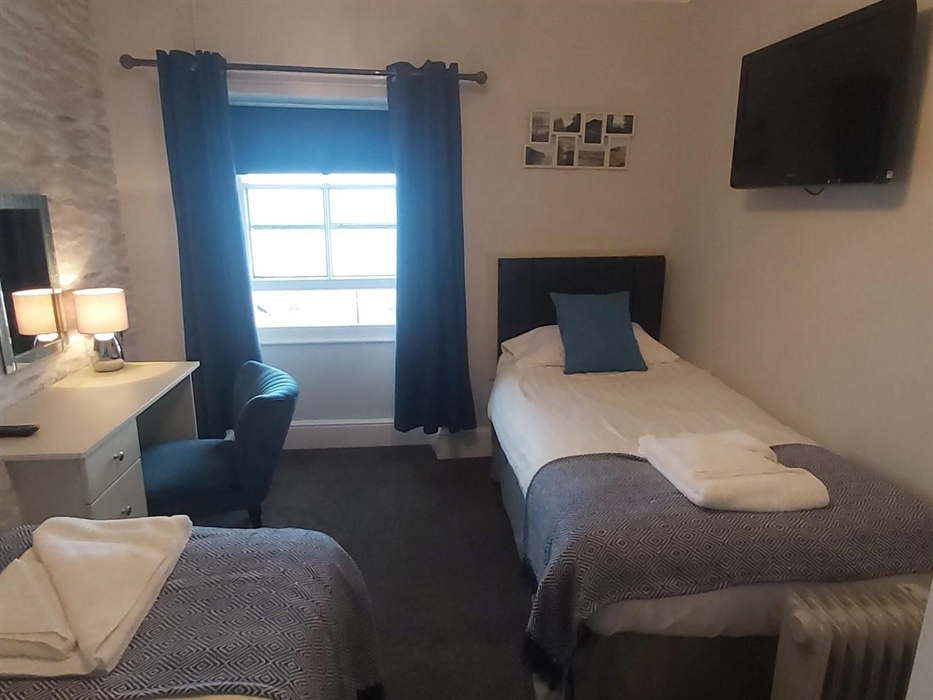 Family Room - 3rd floor - Double and twin room, shared shower room.