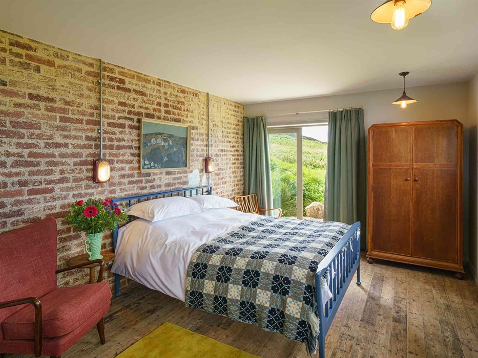 The Bright and comfy king-size bedroom with en suite