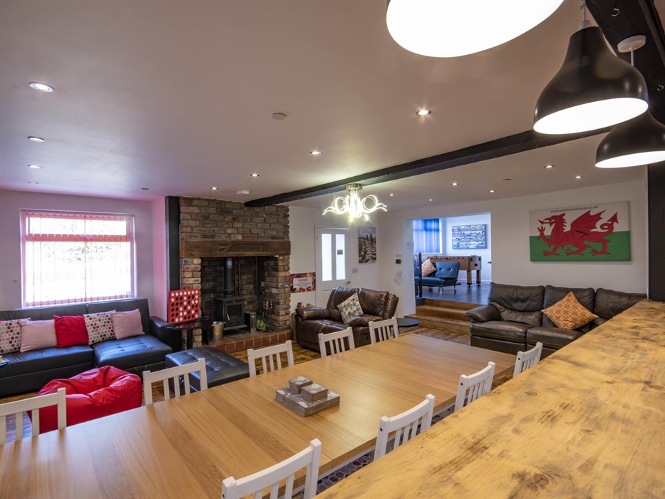 Welsh Row House View from kitchen area through to large living area and dining area.  Open plan area to Games room.  Plenty of seating for all guests.