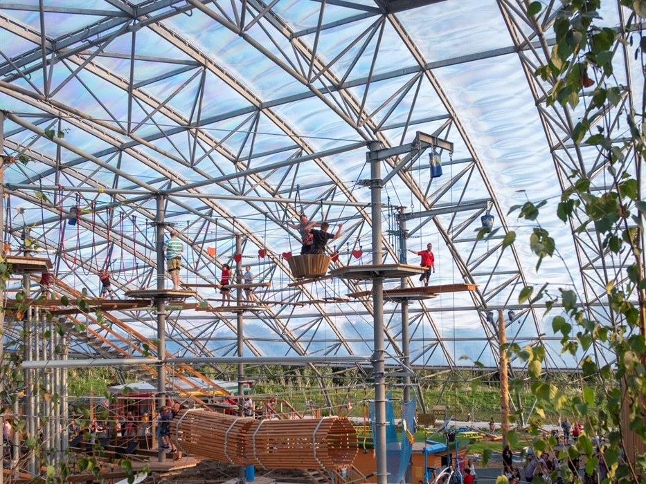 An image of the multi-level, bespoke aerial adventure course that you'll find underneath the Serendome's transparent roof.