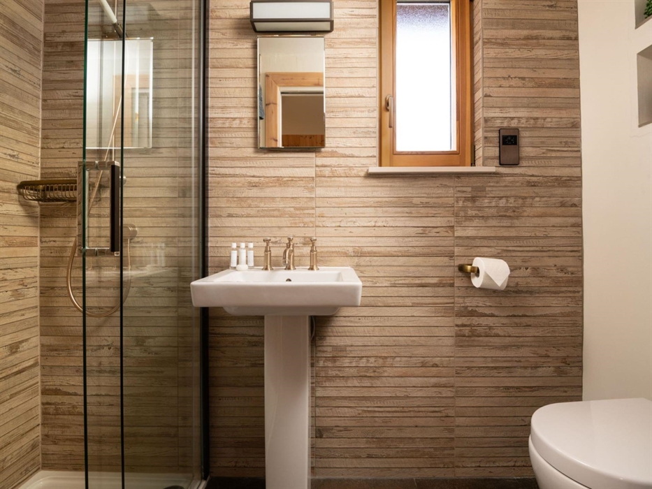 A stylish ensuite with complimentary toiletries from the white company