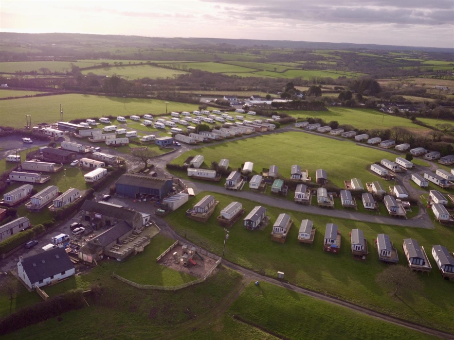 A sunset arial shot of the site.