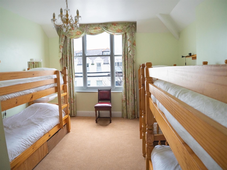 Beautiful 2nd floor bedroom suitable for family or group of friends.  This room sleeps 6 people.  It is large enough to fit a cot if required.  The sh