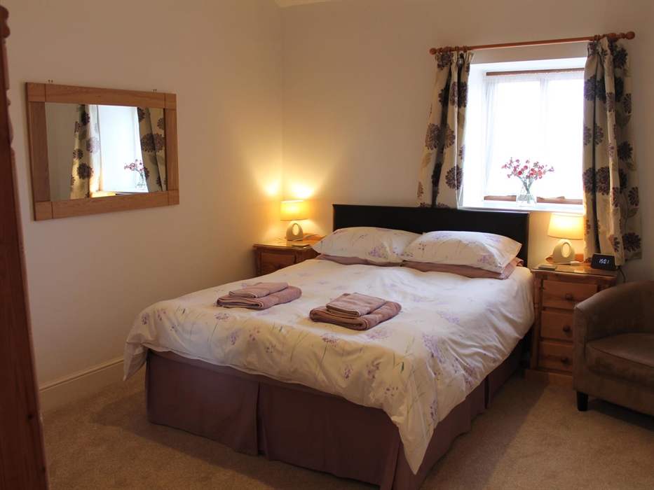 with 5' king bed & utility cupboard