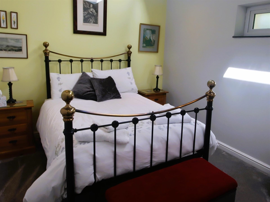 Next to shower room. Hair Dryer. Quality Bedlinen, Pillow protectors, Mattress Protectors used throughout cottage bedroom and changed frequently.