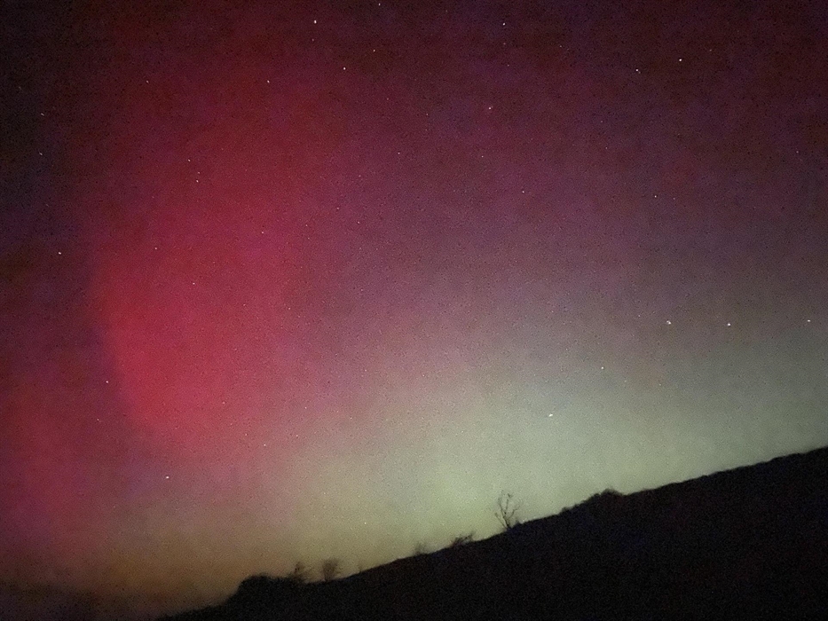 The aurora making an appearance in the Cambrian Mountains an official dark sky area of Mod Wales