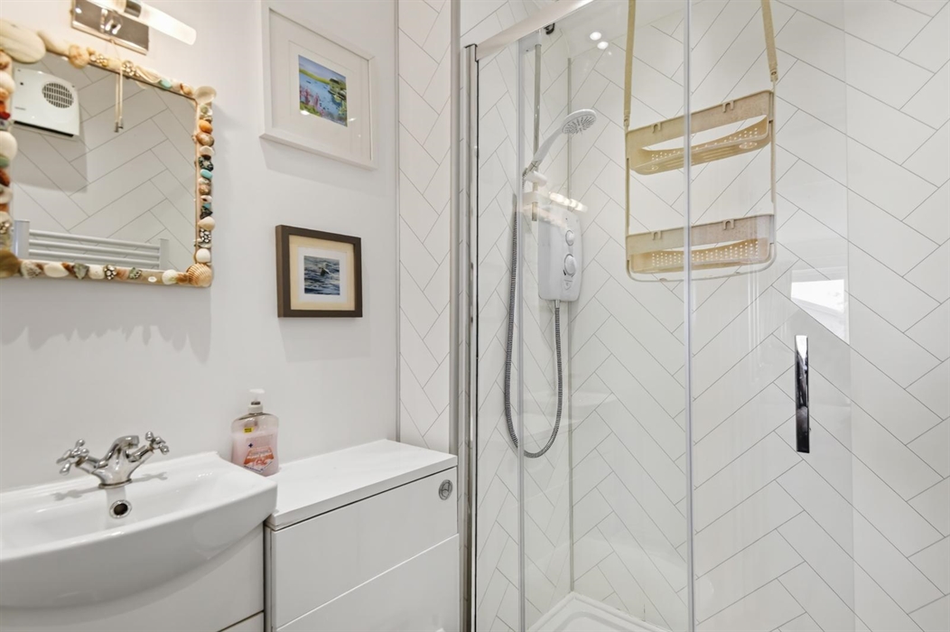 Ensuite shower room, with a shaver point in the vanity unit