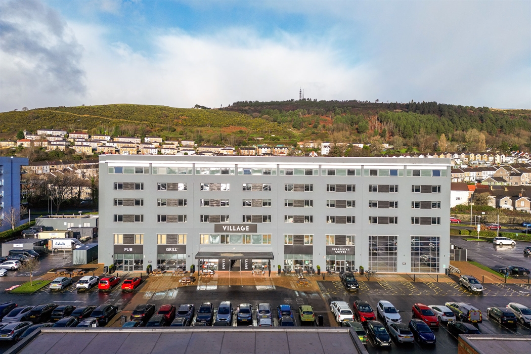 Aerial shot of the exterior of a hotel.