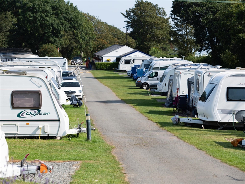Caravan pitches looking down the site towards the toilet block