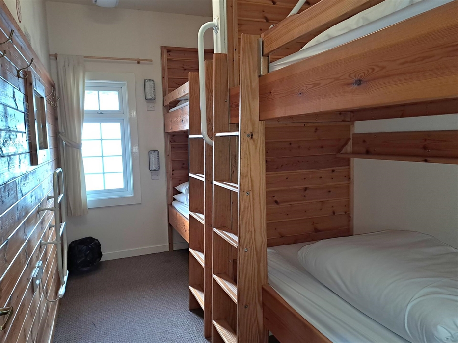 Bedroom. All 5 bedrooms have 4 beds.