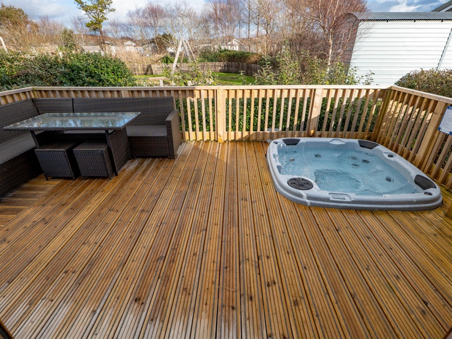 Luxury Lodge Decking with Furniture and Hot Tub