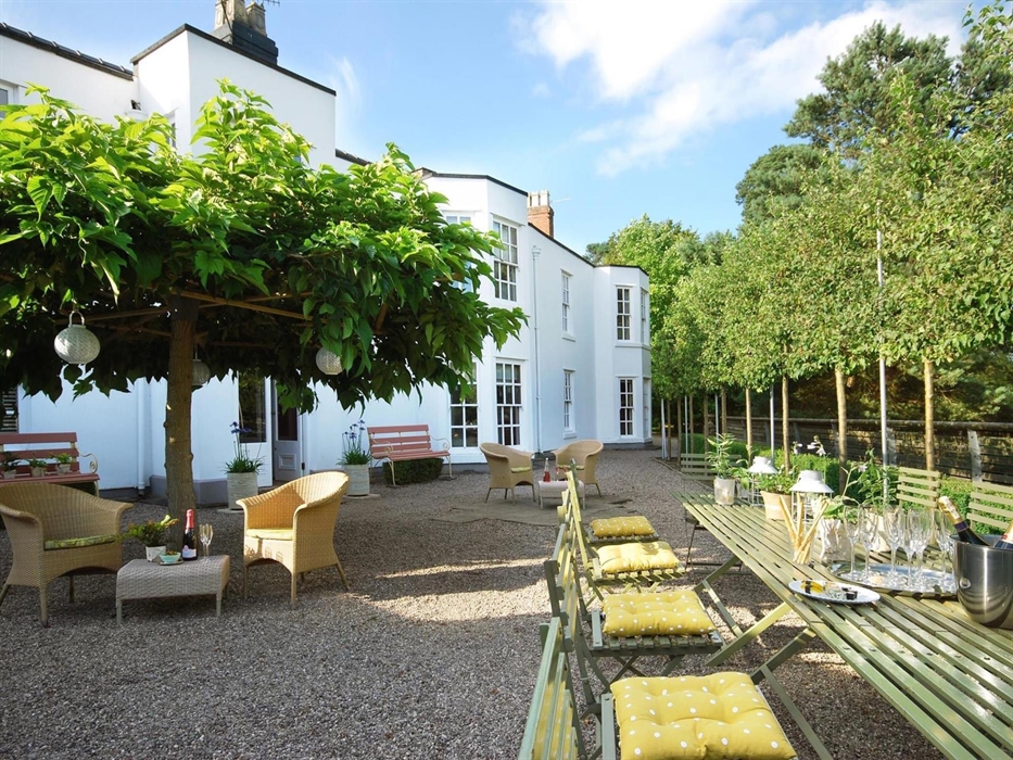 the terrace at bryn tanat hall, overlooking the gardens and river tanat below