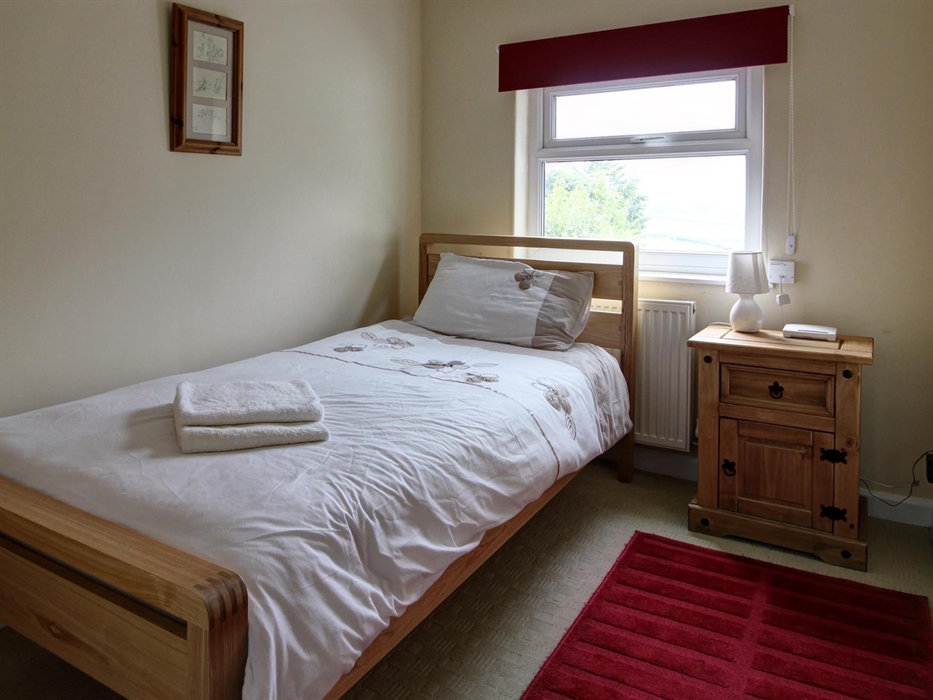 Single bedroom with full size single bed