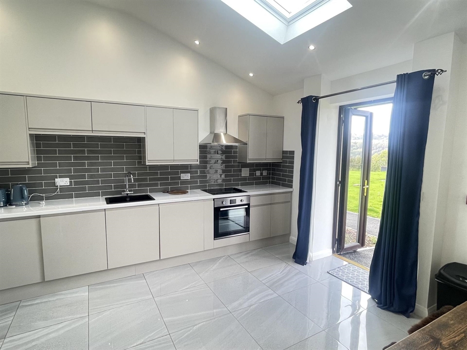 Full fitted kitchen, with all moden faciltes and underfloor heating.  Dinning table suitable for the family.