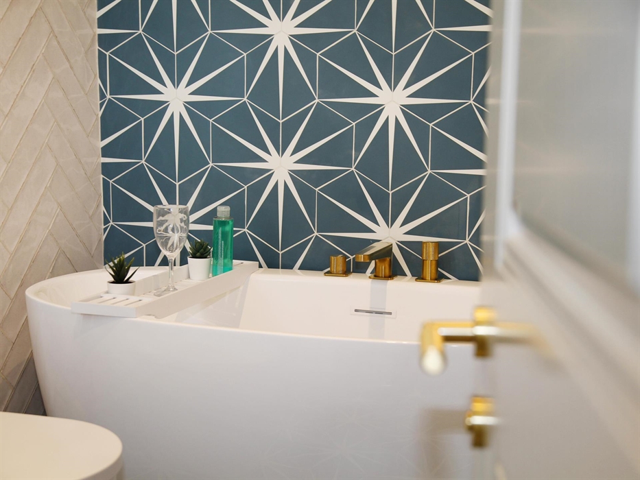 free standing bath, heated towel rail, wc, basin, and bluetooth mirror - on the first floor