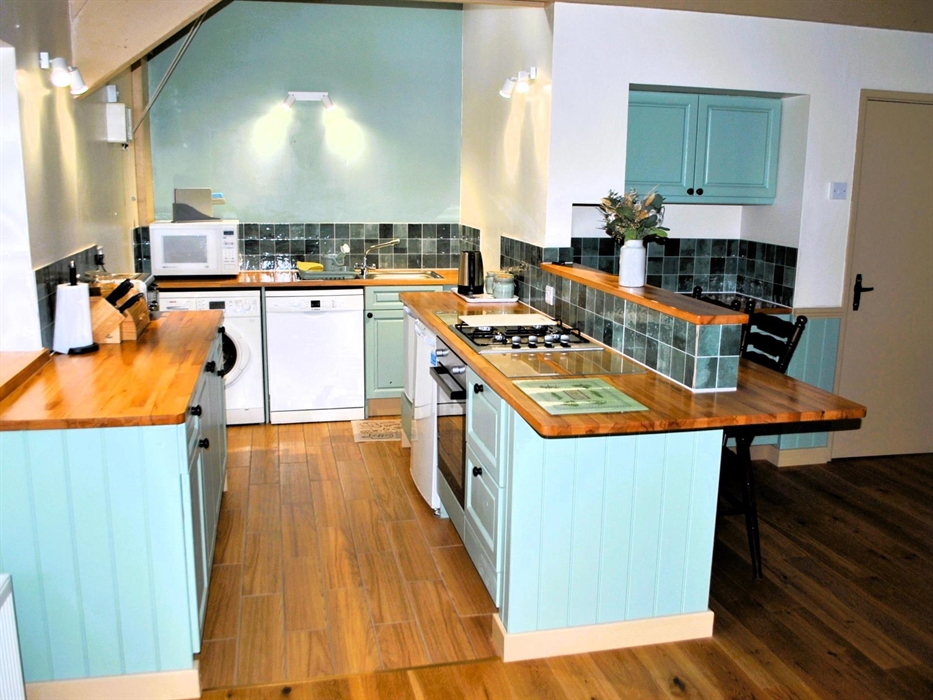 Much expanded and completely renovated, the well appointed and spacious kitchen-diner boasts a gas hob, electric oven, dishwasher and washing machine,