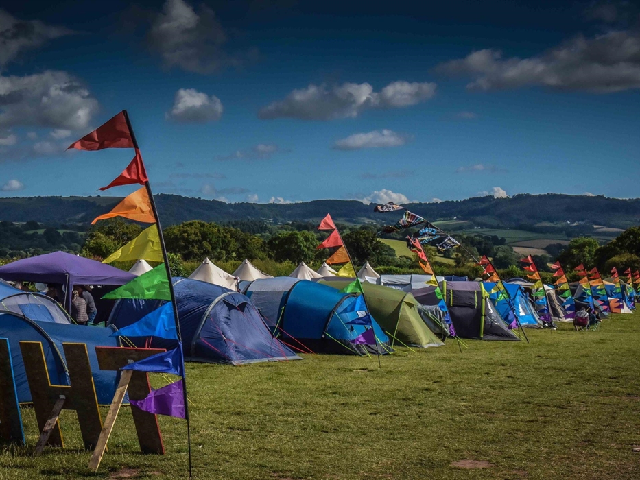 Flags, tent, sun, horizon at The Weekend Rumble