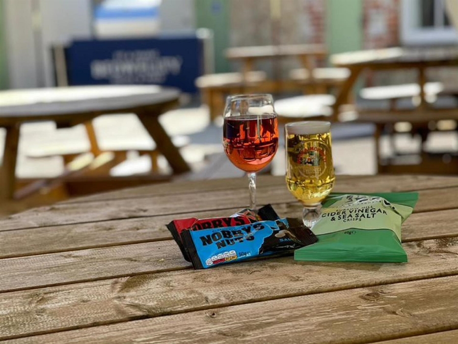 Outdoor seating is provided as a place to relax with a drink and snack.