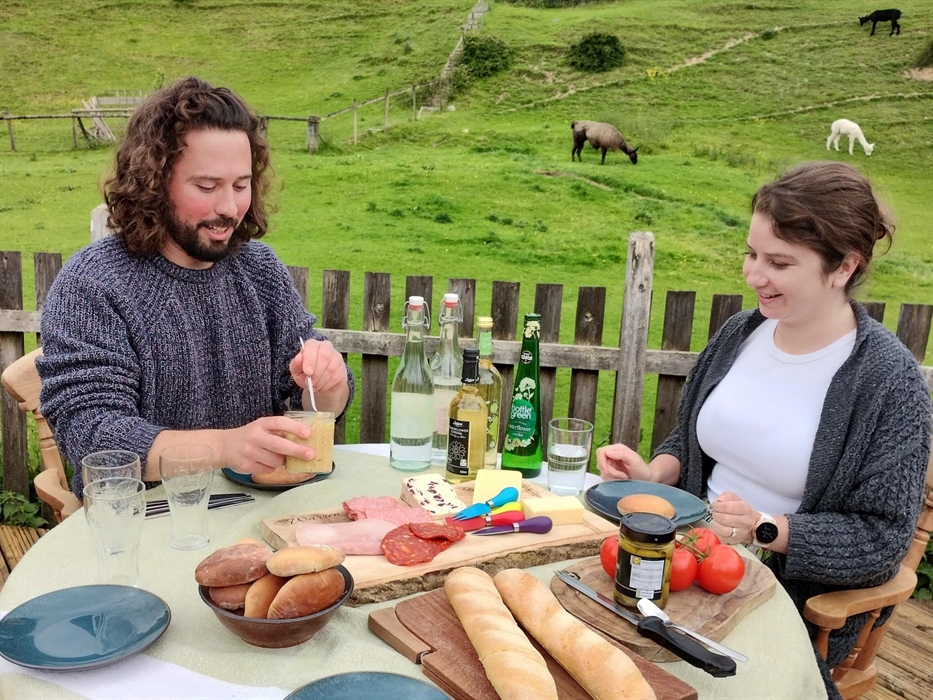 Class participants enjoy a lunch with a glass of wine and some of their bread