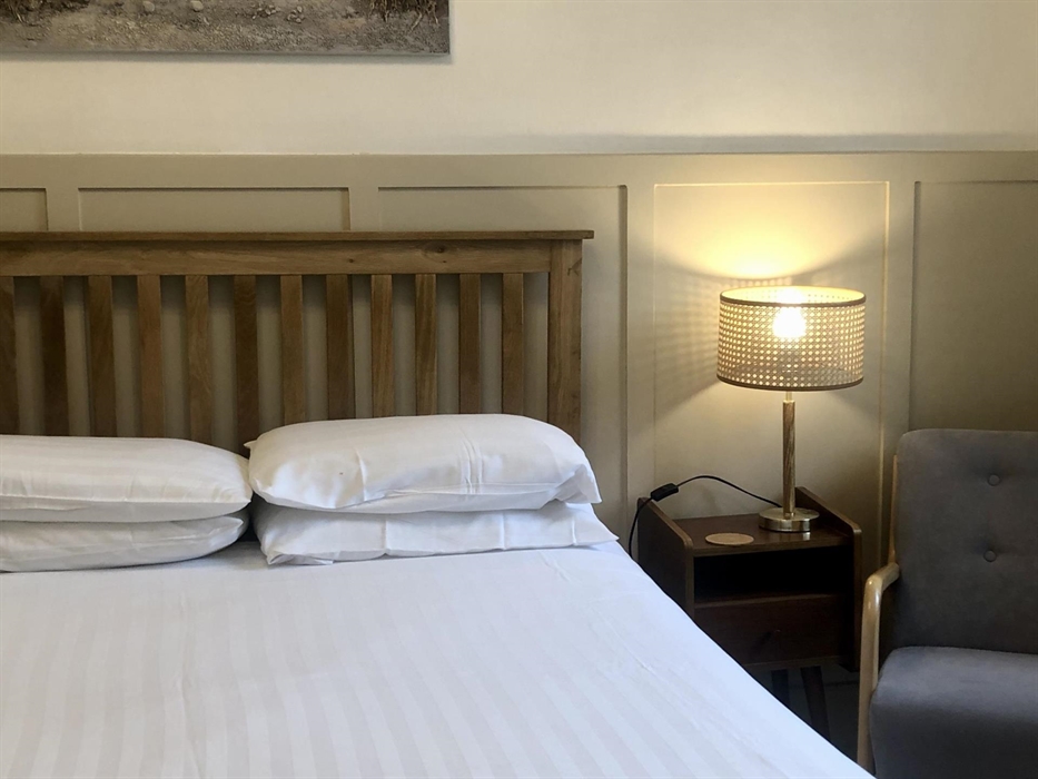 This room is situated on the first floor and has a large shower room.