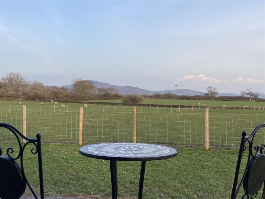 Picture of the views of the Clwydian mountain range from patio outside pod
