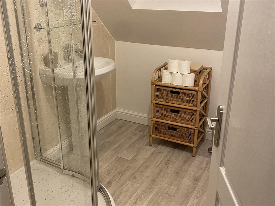 Shower Room linked to King Size bedroom. 1st Floor, 1000mm quadrant shower, basin and WC.