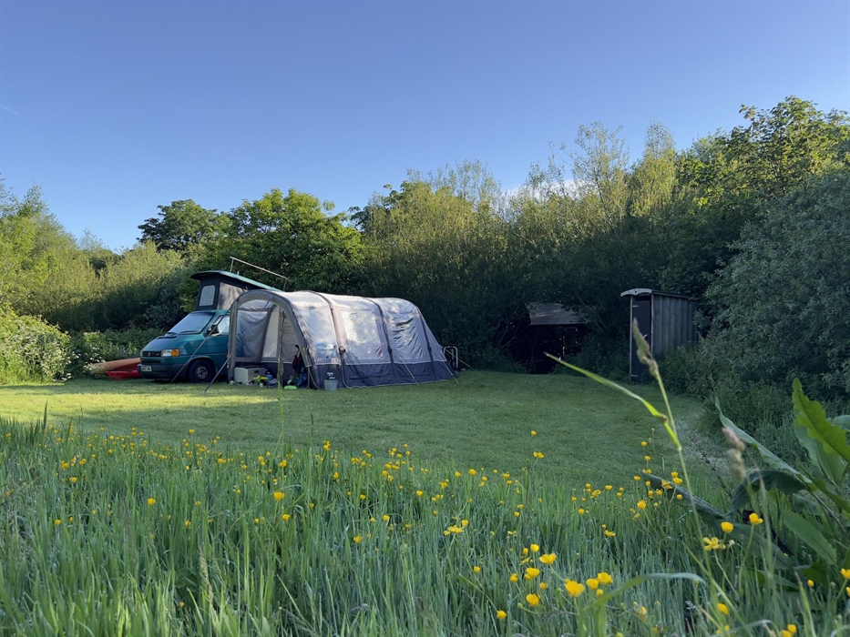 All our pitches are individual (some are for sharing with friends) each with its own covered campfire area, picnic table and composting toilet.