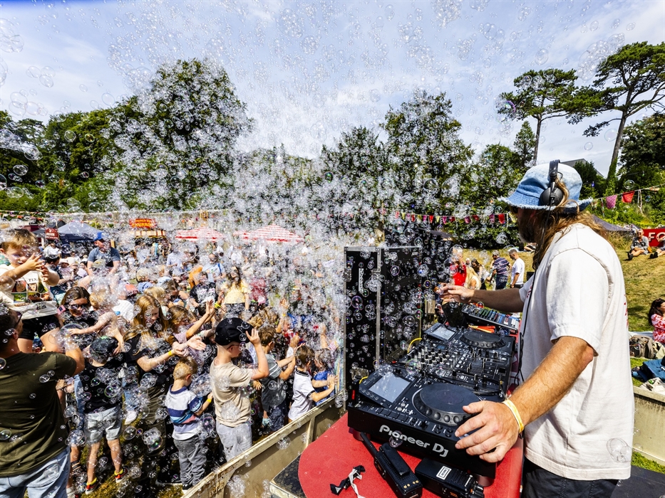 The bubble disco at Fantastic Fete - families dance to a DJ while bubble machines fill the air with bubbles