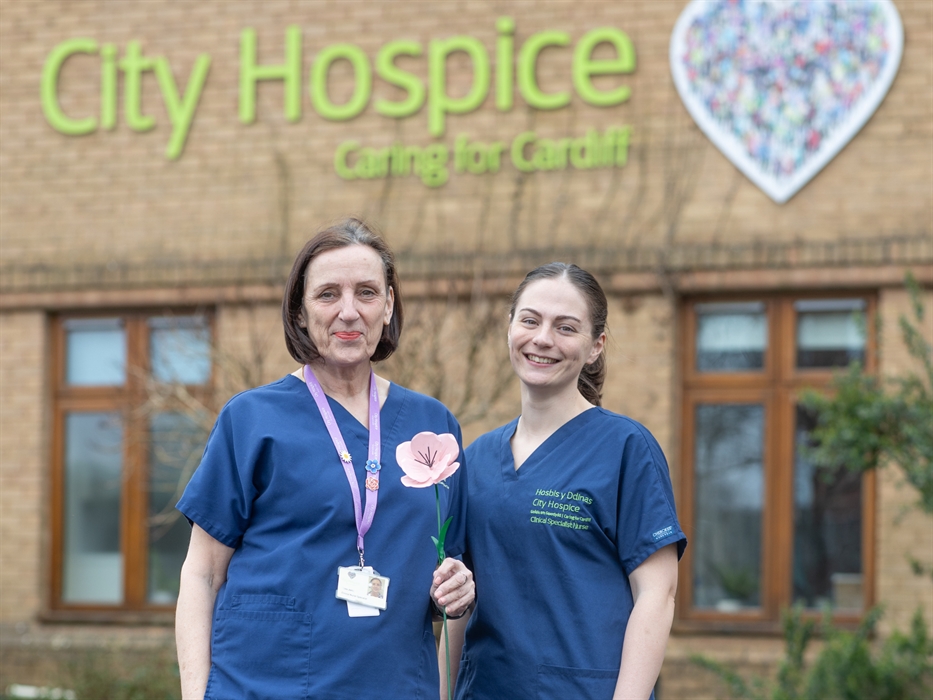 City Hospice nurses with pink poppy