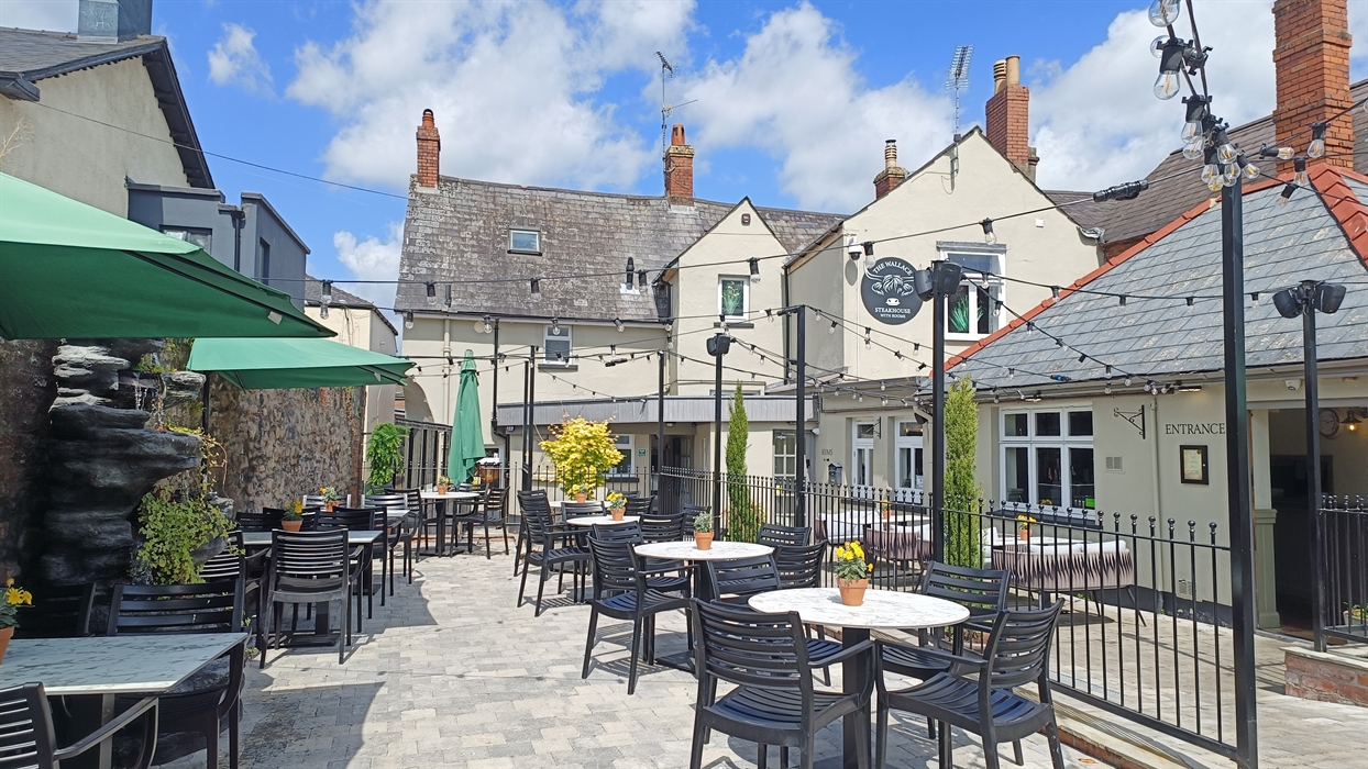 Rear entrance and outdoor dining area on our beautiful terrace.