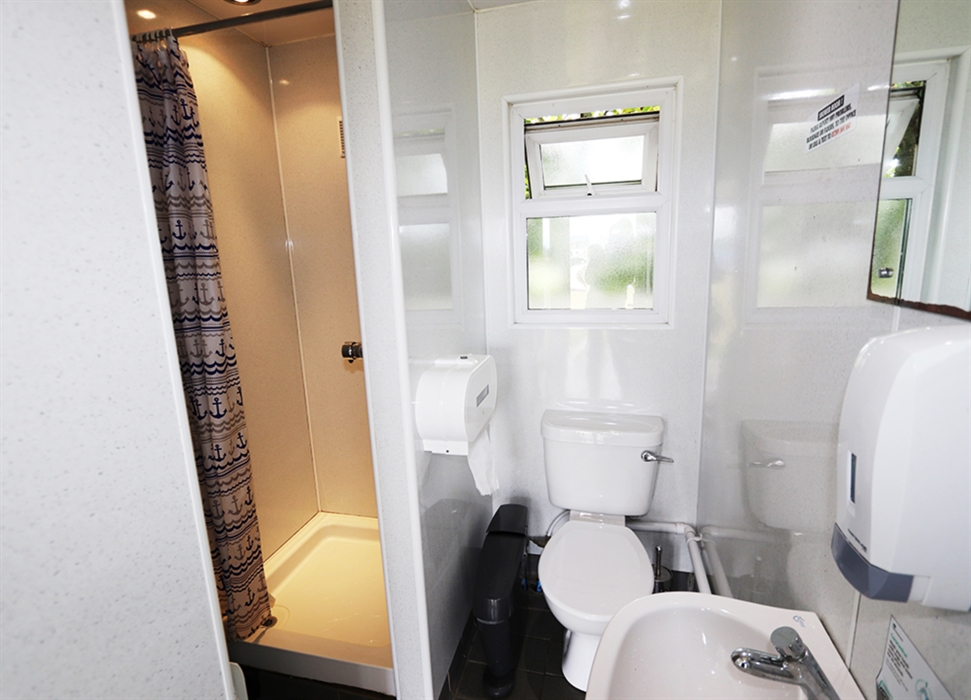 Shower, toilet, sink washing room