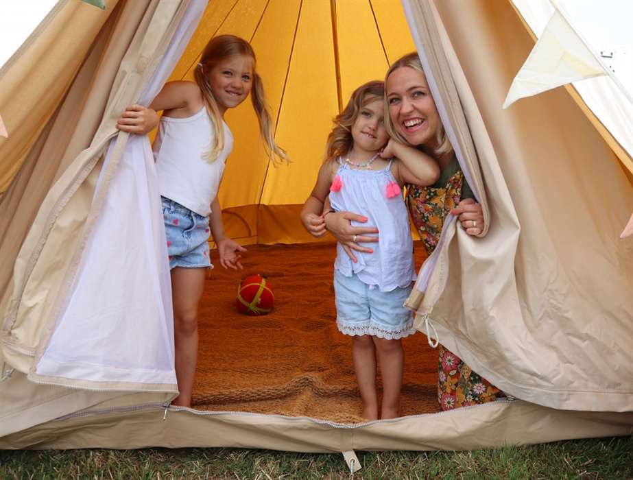Mother & children enjoying a glamping holiday