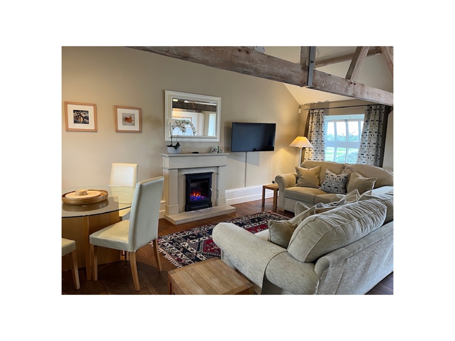 Cosy living area in Holly cottage
