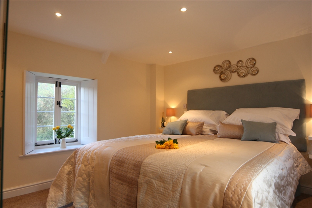 Superking master bedroom at Tintern Abbey Cottage has TV, heating and that fabulous view