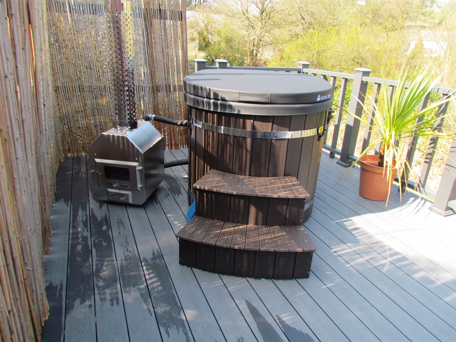 Enjoy a soak in the wood fired hot tub!. Take in the views and nature while listening to the crackling of the logs.