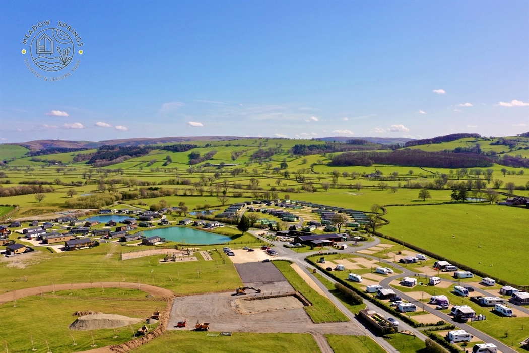 A drone shot of the lodge parks, the touring park and the new Pool & Spa complex starting