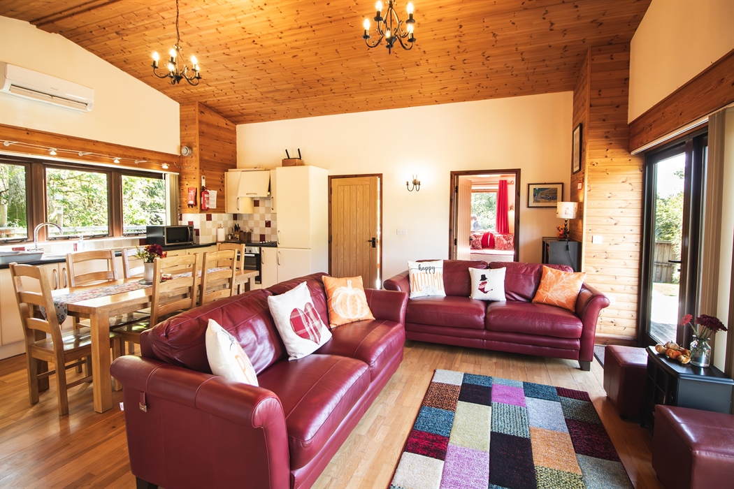 Lounge area with smart TV and a view across the countryside.