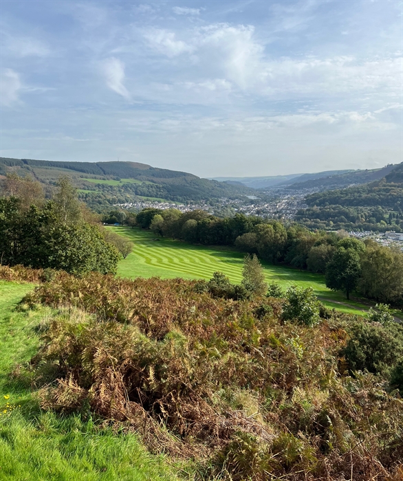 A photograph showing the view from the 18th hole at Mountain Ash Golf Club