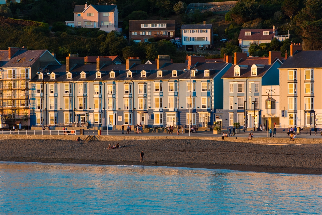 Hotel seafront exterior at sunset