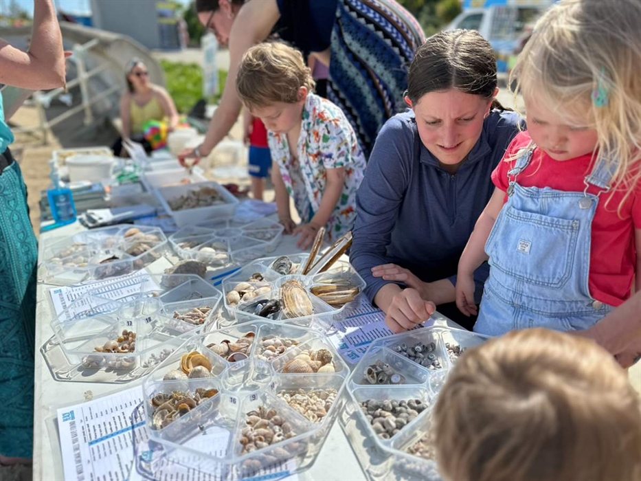 A group of people taking part in sea festival crafts