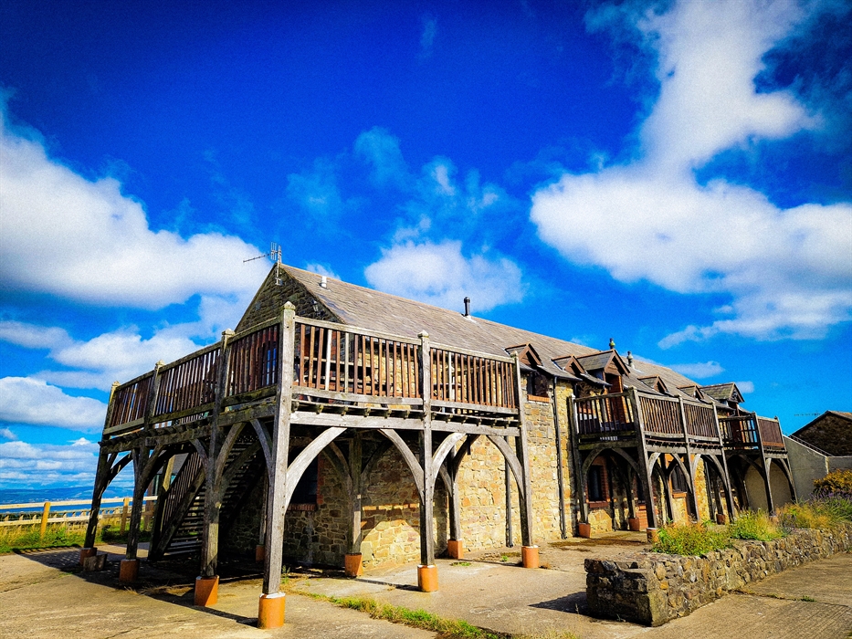 Green oak balconies crafted from our woodland