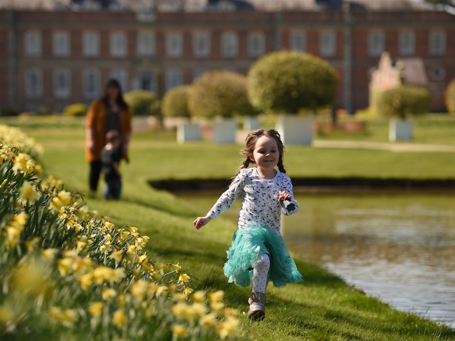 Visitors in the garden in spring at Erddig. Credit: National Trust Images/John Millar.
