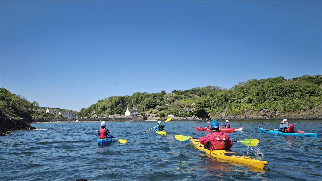 Sea kayakers paddling towards shore